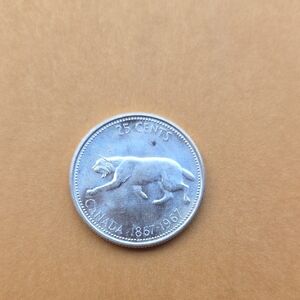 Canadian 25 Cents Coin with Lynx Design